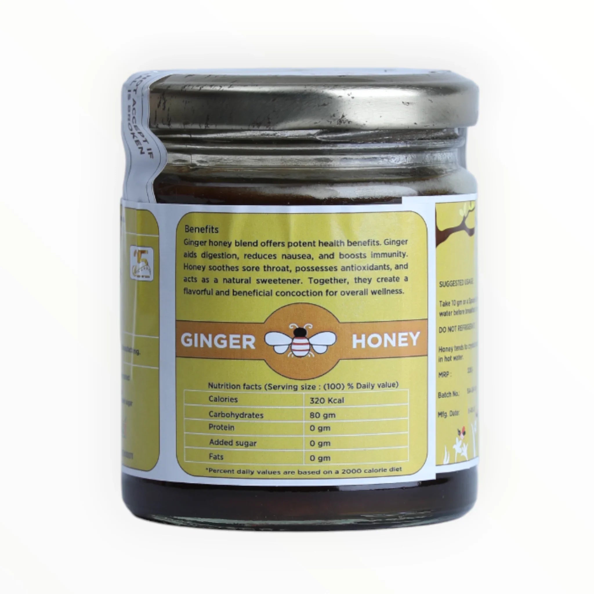Jar of ginger honey with a label on a white background